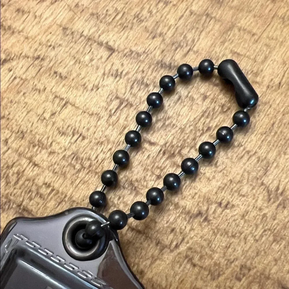 Coach Poppy plastic hangtag smoky gray with chunky ballchain
